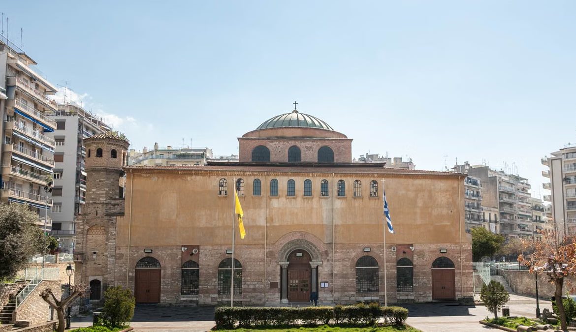 Front view of the historic Hagia Sophia Church in Thessaloniki, Greece, under a clear blue sky.